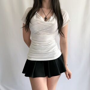 delicate layered white top with lace back